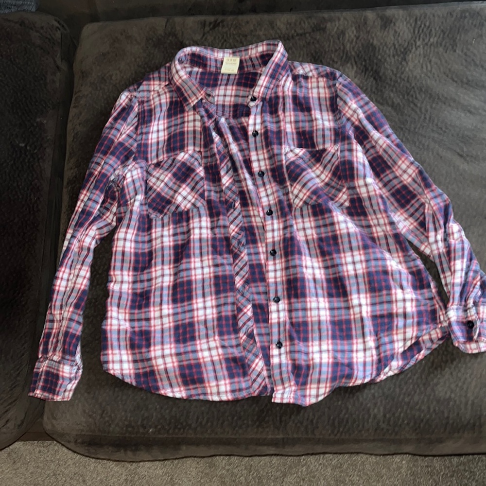 Plaid red, white and blue.comes with pockets